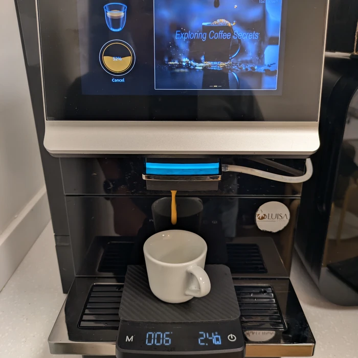 Fresh espresso pouring from a Luisa Coffee bean-to-cup machine